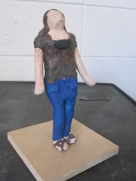 Sarah D., Modeling clay, Self-portrait, Figures, Fall 2013
